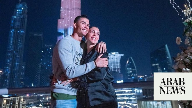 Cristiano Ronaldo goes handbag shopping for girlfriend Georgina Rodriguez  as Real Madrid star's son Cristiano Jr wears custom jacket