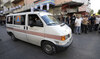 An ambulance believed to be carrying wounded people, after multiple explosions were heard in Beirut on Wednesday.