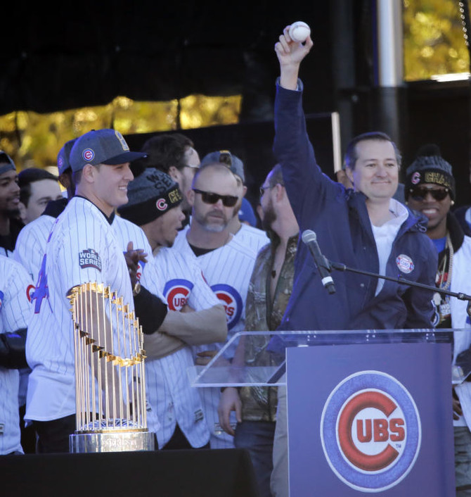 Chicago White Sox fans cheer at a parade and rally held in honor