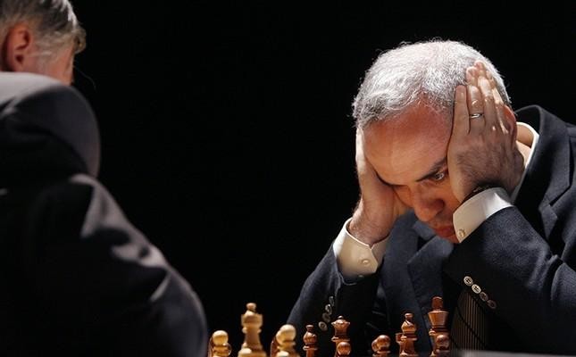 Bucharest, Romania. 5th May, 2023: Garry Kasparov, former Russian chess  grandmaster, the best chess player of all time, make the first move in a  simultaneous chess game with children at the end