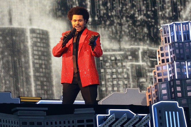 The Weeknd - red suit character made it on Rolling Stone