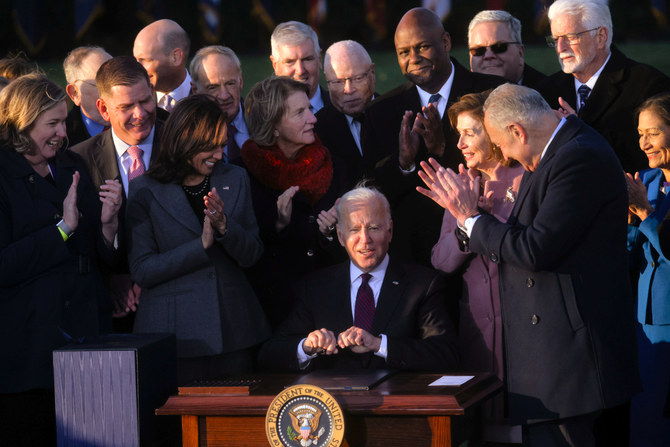 Biden celebrates rare win with US infrastructure bill signing